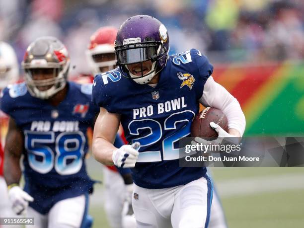 Safety Harrison Smith of the Minnesota Vikings from the NFC Team runs back an interception during the NFL Pro Bowl Game at Camping World Stadium on...