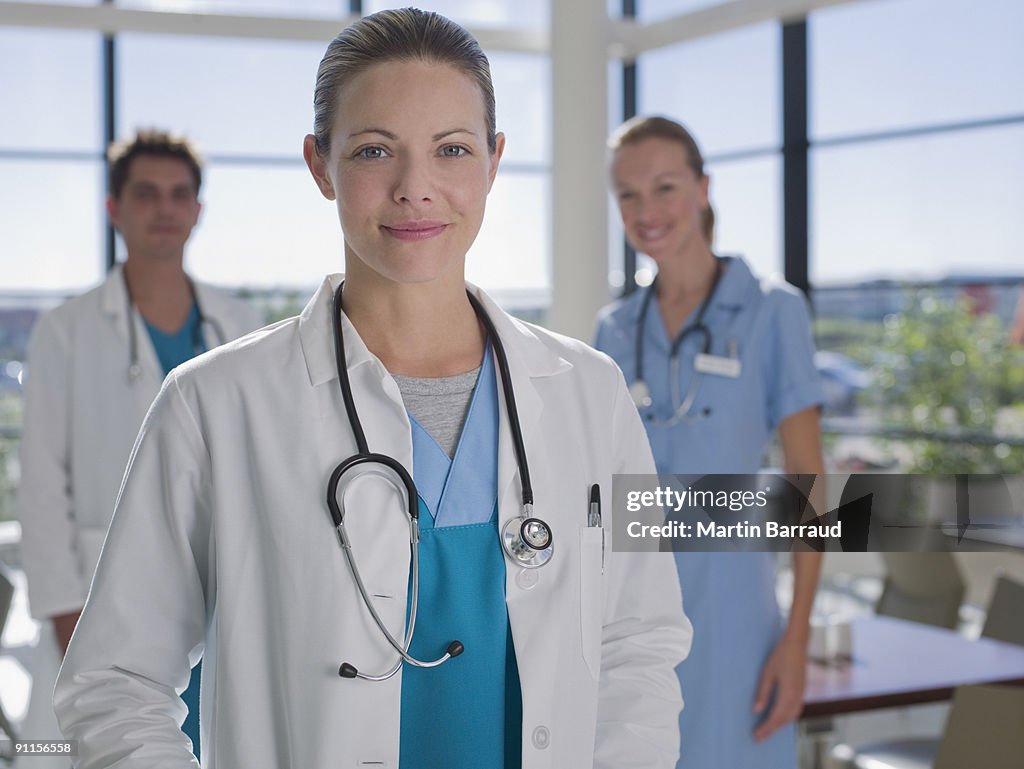 Doctors and nurse standing in cafeteria