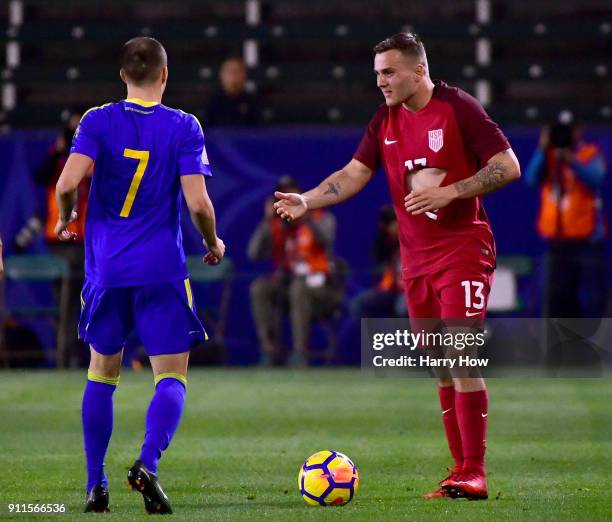 Jordan Morris of The United States reacts to his ripped shirt from Darko Todorovic of Bosnia Herzegovina during a 0-0 draw at StubHub Center on...