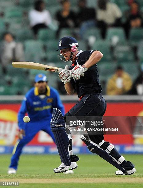 England's Paul Collingwood plays a shot during the ICC Champions Trophy group match between England and Sri Lanka at Wanderers in Johannesburg on...