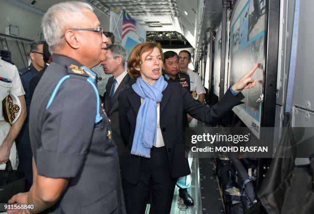French Defence Minister Florence Parly and Malaysia's Chief of Air Force General Affendi Buang talk inside the Royal Malaysian Air Force Airbus A400M...