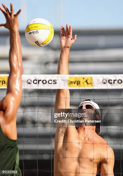 Todd Rogers of USA hits against Brazil during the AVP Crocs Tour World Challenge at the Westgate City Center on September 25, 2009 in Glendale,...