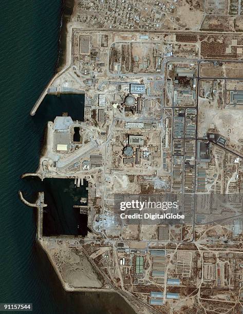 In this satellite image Iran's Nuclear Power Station stands beside the coast, in Bushehr, Iran. According to reports Iran's nuclear programme began...