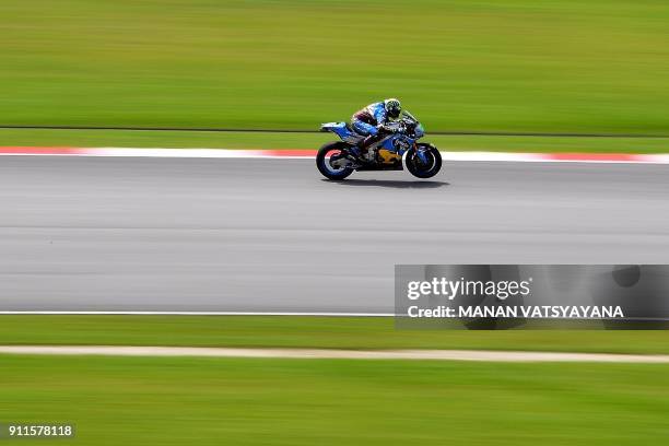 Marc VDS Team's Italian rider Franco Morbidelli powers his bike during the second day of the 2018 MotoGP pre-season test at the Sepang International...