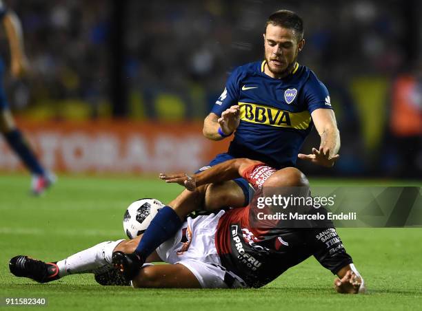 Clemente Rodriguez of Colon fights for ball with Nahitan Nandez of Boca Juniors during a match between Boca Juniors and Colon as part of the...