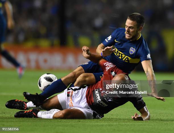 Clemente Rodriguez of Colon fights for ball with Nahitan Nandez of Boca Juniors during a match between Boca Juniors and Colon as part of the...