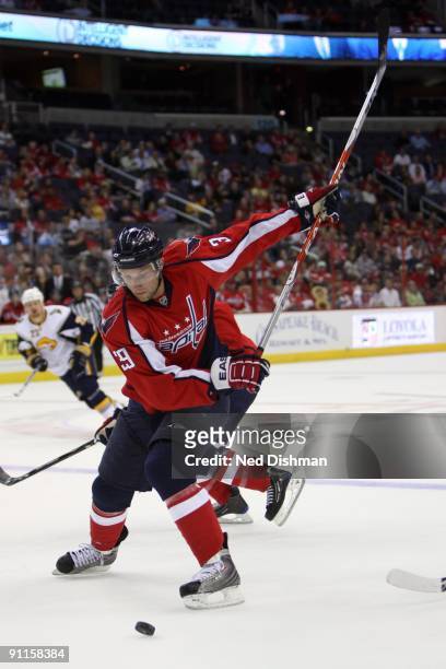David Steckel of the Washington Capitals shoots against the Buffalo Sabres during an NHL preseason hockey game on September 21, 2009 at the Verizon...