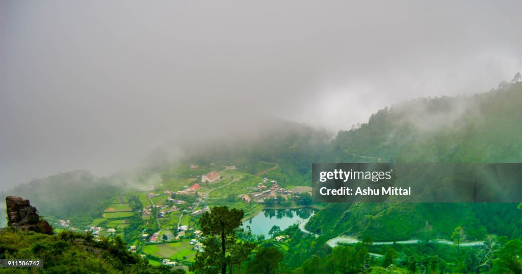 Green hills covered with clouds