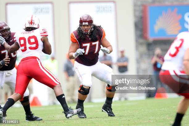 Offensive lineman Ed Wang of the Virginia Tech University Hokies blocks against the University of Nebraska Cornhuskers on September 19, 2009 at Lane...