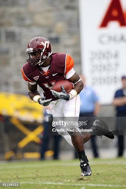 Running back David Wilson of the Virginia Tech University Hokies runs with the ball against the University of Nebraska Cornhuskers on September 19,...