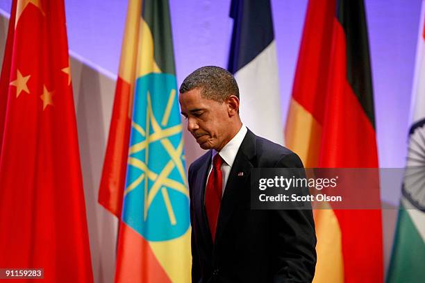 President Barack Obama heads off stage following a news conference at the David Lawrence Convention Center at the end of the G-20 Summit September...
