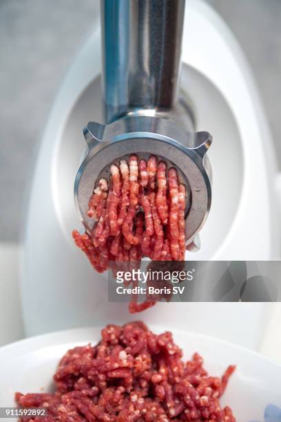 making traditional shepherds pie - meat grinder stock pictures, royalty-free photos & images