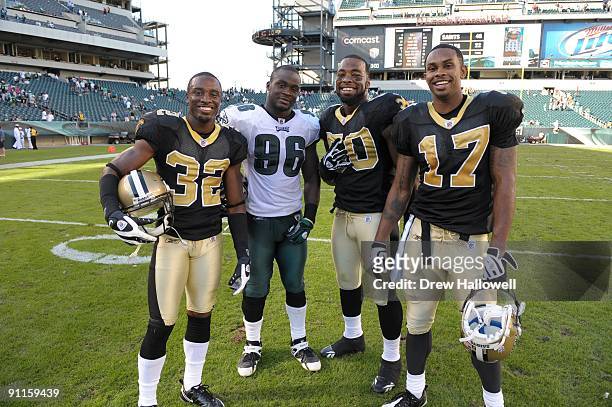 Linebacker Omar Gaither of the Philadelphia Eagles poses for a photograph with cornerback Jabari Greer, Marvin Mitchell and wide receiver Robert...