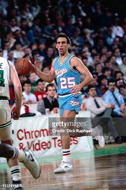 Brook Steppe of the Sacramento Kings moves the ball up court against the Boston Celtics during a game played in 1987 at the Boston Garden in Boston,...