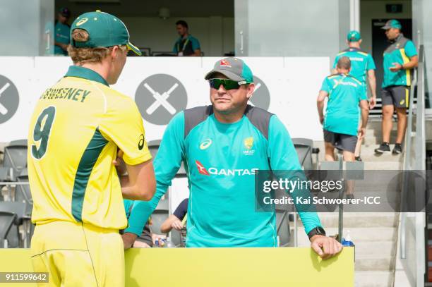 Head Coach Ryan Harris of Australia speaks to Nathan McSweeney of Australia following the ICC U19 Cricket World Cup Semi Final match between...