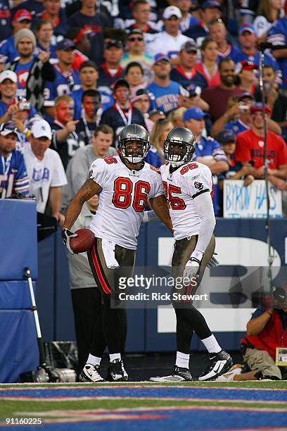 Tight end Jerramy Stevens of the Tampa Bay Buccaneers celebrates with teammate Maurice Stovall during the game against the Buffalo Bills at Ralph...