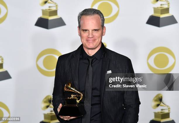 Actor Michael Park, winner of the Best Musical Theater Album award for 'Dear Evan Hansen' poses in the press room during the 60th Annual GRAMMY...