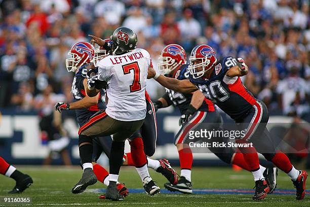 Defensive end Chris Kelsay of the Buffalo Bills tackles quarterback Byron Leftwich of the Tampa Bay Buccaneers during the game at Ralph Wilson...