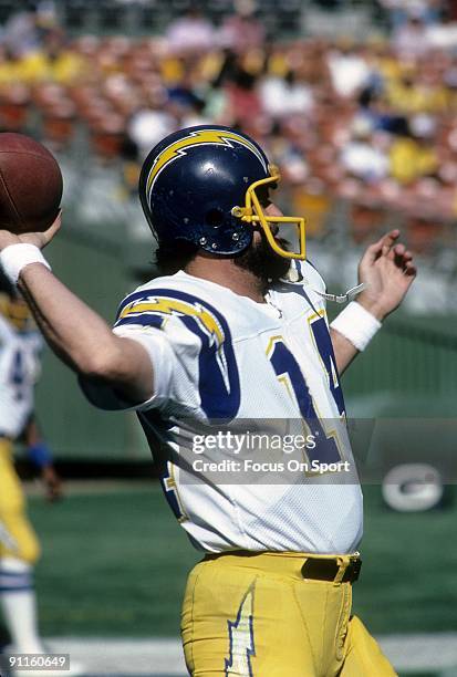 Quarterback Dan Fouts of the San Diego Chargers warms up before an NFL football game circa early 1980's. Fouts played for the Chargers from 1973-87.