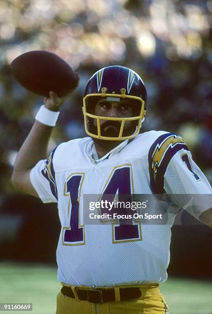 Quarterback Dan Fouts of the San Diego Chargers warms up before an NFL football game circa early 1980's. Fouts played for the Chargers from 1973-87.