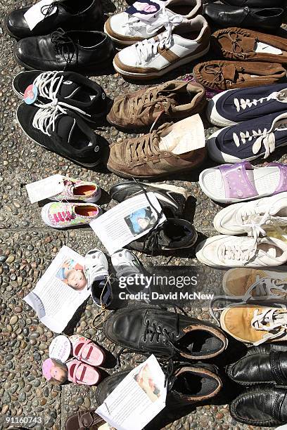 The empty shoes of murder victims are displayed on National Day of Remembrance for Murder Victims on September 25, 2009 in Los Angeles, California....