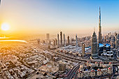 City lights in Dubai at sunrise