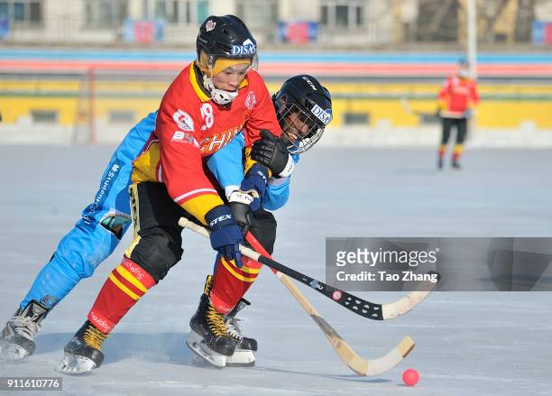 Players in action in the 2018 World Bandy Championship Men B Group during the match between China and Somalia at the Harbin sport university Stadium...