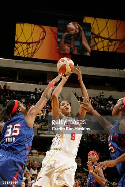 Tammy Sutton-Brown of the Indiana Fever shoots over Cheryl Ford of the Detroit Shock during Game Two of the Eastern Conference Finals at Conseco...