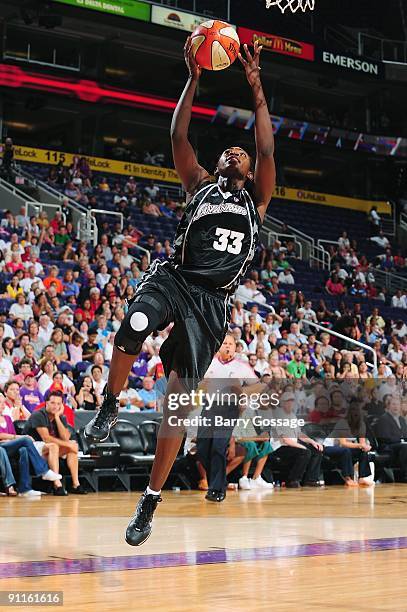 Sophia Young of the San Antonio Silver Stars takes the ball to the basket against the Phoenix Mercury during Game Three of the WNBA Western...