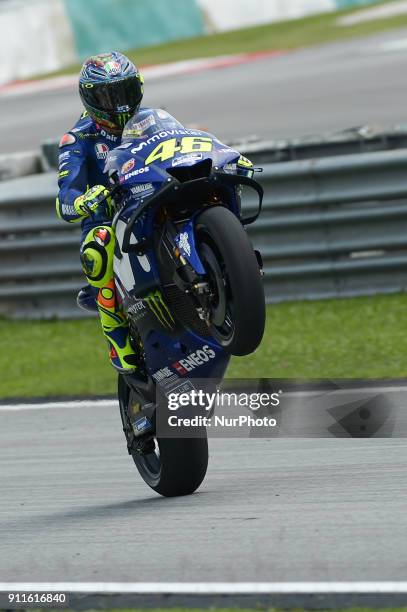 Movistar Yamaha MotoGP's rider Valentino Rossi of Italy powers his bike during the second day of the 2018 MotoGP pre-season test at the Sepang...