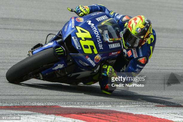 Movistar Yamaha MotoGP's rider Valentino Rossi of Italy powers his bike during the second day of the 2018 MotoGP pre-season test at the Sepang...
