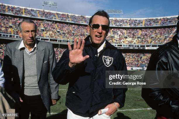 Los Angeles Raiders owner Al Davis walks on the field during the game against the Denver Broncos at Mile High Stadium on December 8, 1985 in Denver,...