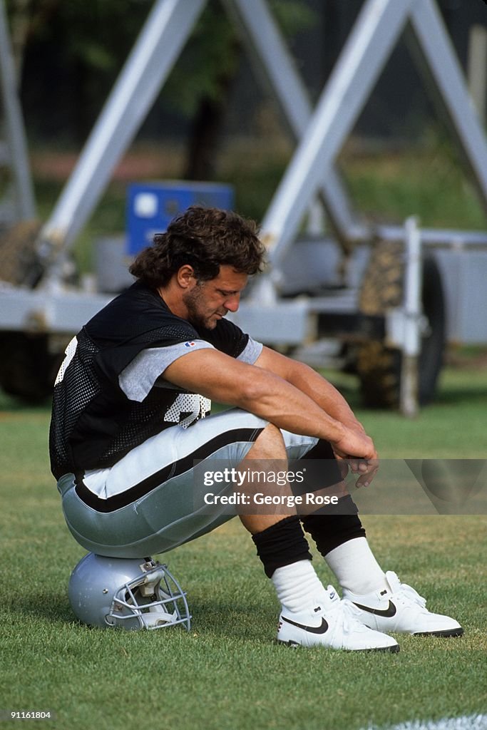 Lyle Alzado of the Los Angeles Raiders looks on during August of