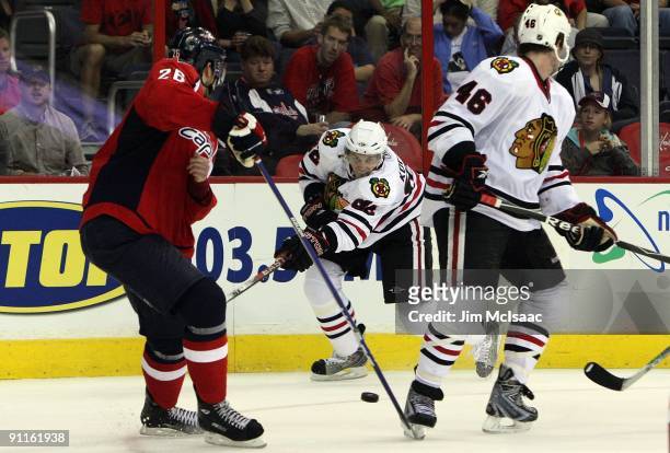 Tomas Kopecky of the Chicago Blackhawks shoots the puck against the Washington Capitals during their preseason game on September 23, 2009 at the...