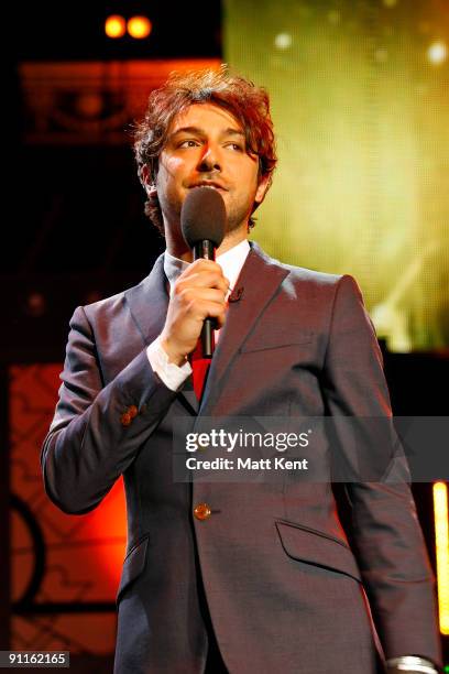 Compere Alex Zane performs on stage as part of Orange RockCorps at the Royal Albert Hall on September 25, 2009 in London, England.