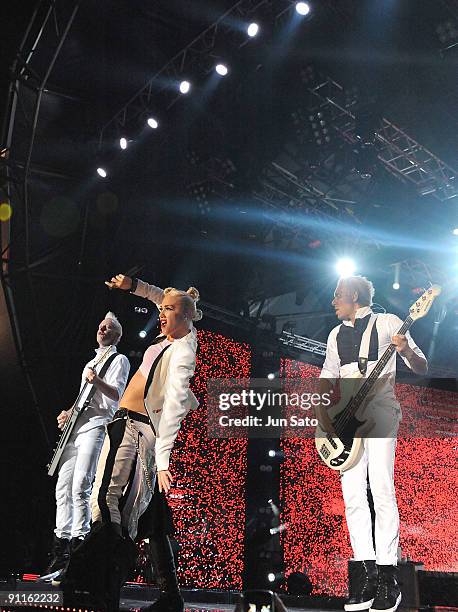 Tom Dumont, Gwen Stefani and Tony Kanal of No Doubt performs on stage on the second day of the three day F1 Rocks Singapore concert at Fort Canning...