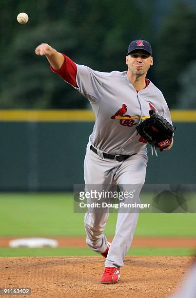 Starting pitcher Chris Carpenter of the St. Louis Cardinals delivers against the Colorado Rockies at Coors Field on September 25, 2009 in Denver,...