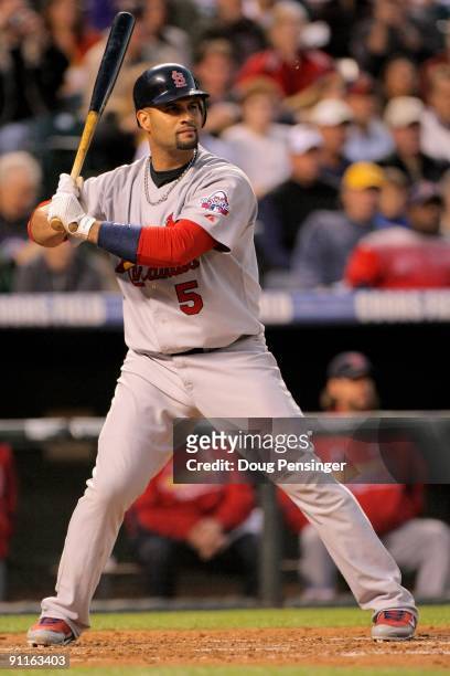 First baseman Albert Pujols of the St. Louis Cardinals takes an at bat against the Colorado Rockies at Coors Field on September 25, 2009 in Denver,...