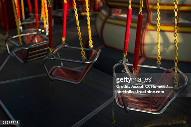 amusement park swing ride - joseph o. holmes stock pictures, royalty-free photos & images