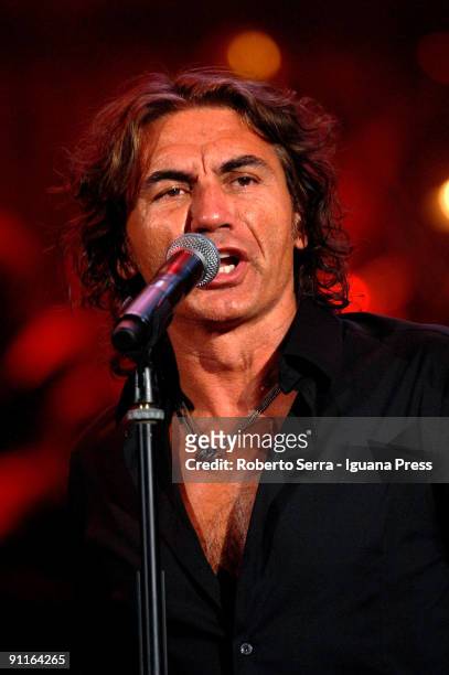 Luciano Ligabue performs with Arena's Simphony Orchestra at Arena di Verona on September 24, 2009 in Verona, Italy.