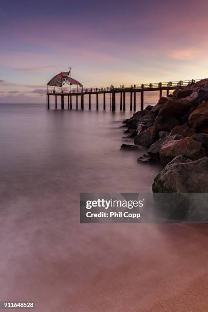 jetty sunrise - townsville stock-fotos und bilder