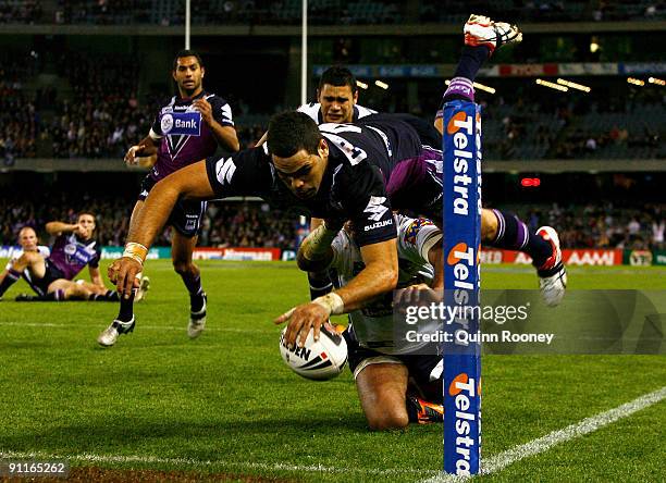 Greg Inglis of the Storm scores a try during the second NRL Preliminary Final match between the Melbourne Storm and the Brisbane Broncos at Etihad...