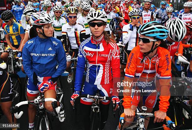 Elizabeth Armitstead and Nicole Cooke of Great Britain and Martine Bras of the Netherlands wait on the start line of the Elite Women's Road Race on...