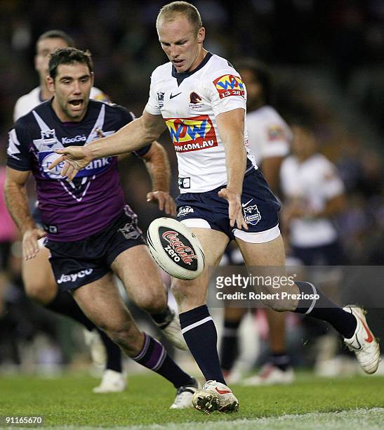Darren Lockyer of the Broncos kicks the ball during the second NRL Preliminary Final match between the Melbourne Storm and the Brisbane Broncos at...