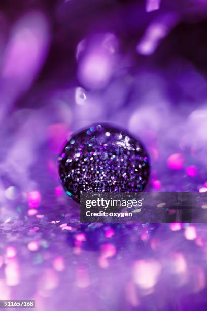 crystal button on bokeh background - crystal christmas tree ornaments fotografías e imágenes de stock