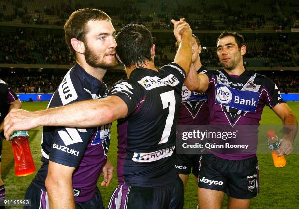 Melbourne Storm players celebrate after the second NRL Preliminary Final match between the Melbourne Storm and the Brisbane Broncos at Etihad Stadium...