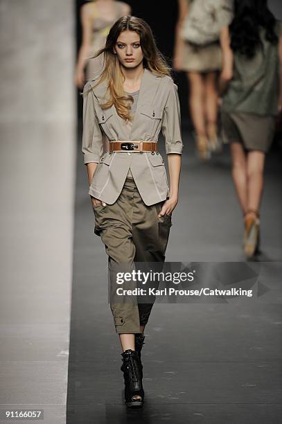 Model walks the runway during the Sportmax Spring Summer 2010 Ready To Wear show as part of the Milan Womenswear Fashion Week Spring/Summer 2010 at...