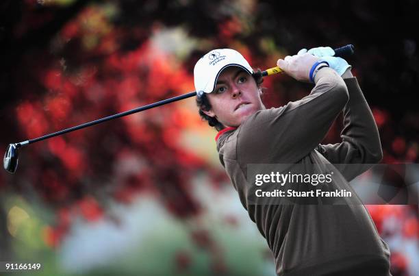 Rory McIlroy of the Great Britian and Northern Ireland team plays his tee shot on the fifth hole during the third day morning greensomes at The...