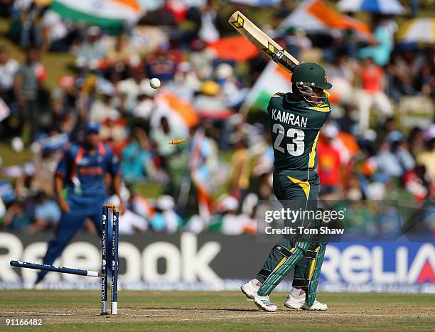 Kamran Akmal of Pakistan is bowled out during the ICC Champions Trophy group A match between India and Pakistan at Centurion on September 26, 2009 in...