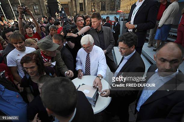 German Foreign Minister and the Social Democrats party main candidate Frank-Walter Steinmeier signs autographs at the end of a SPD election rally in...